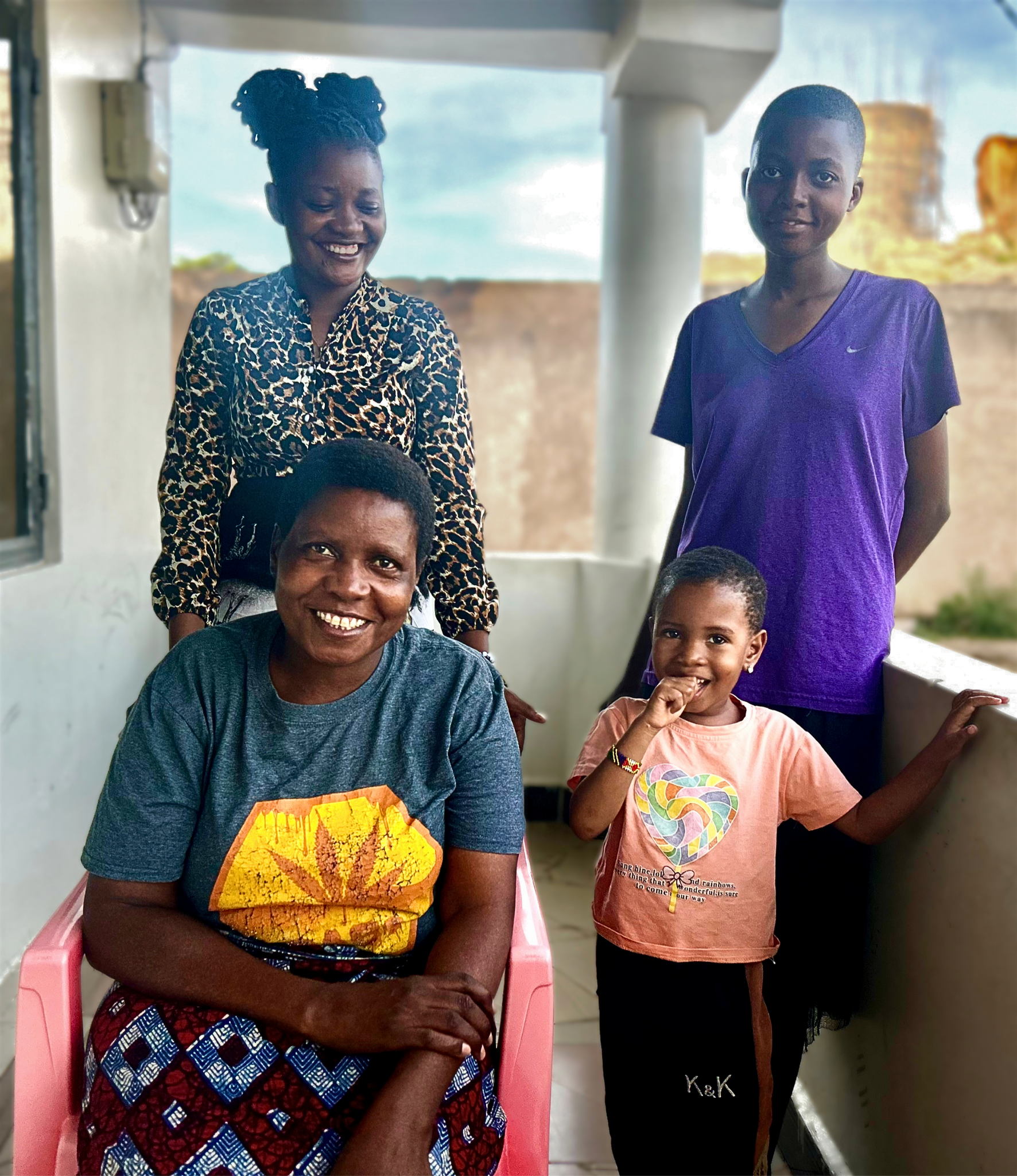 A Tanzanian family smiling together